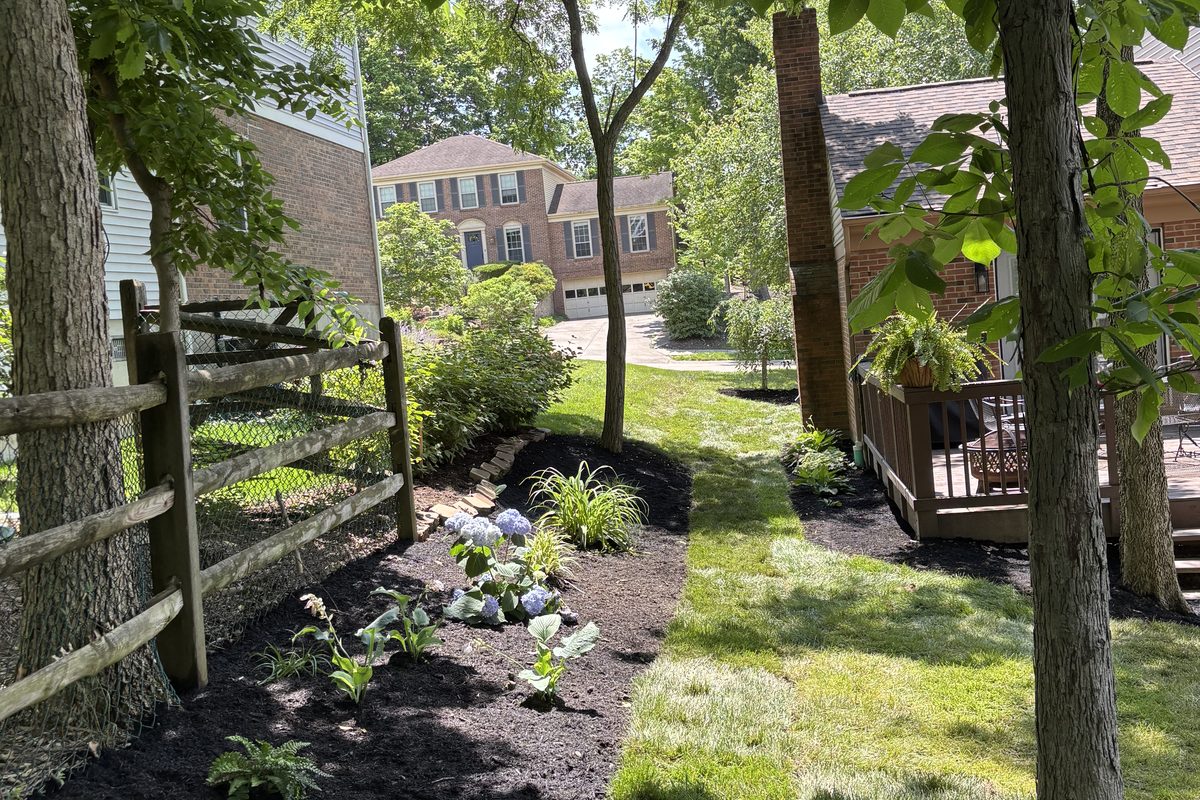 Bulk mulch piles at a Cincinnati landscape supply yard
