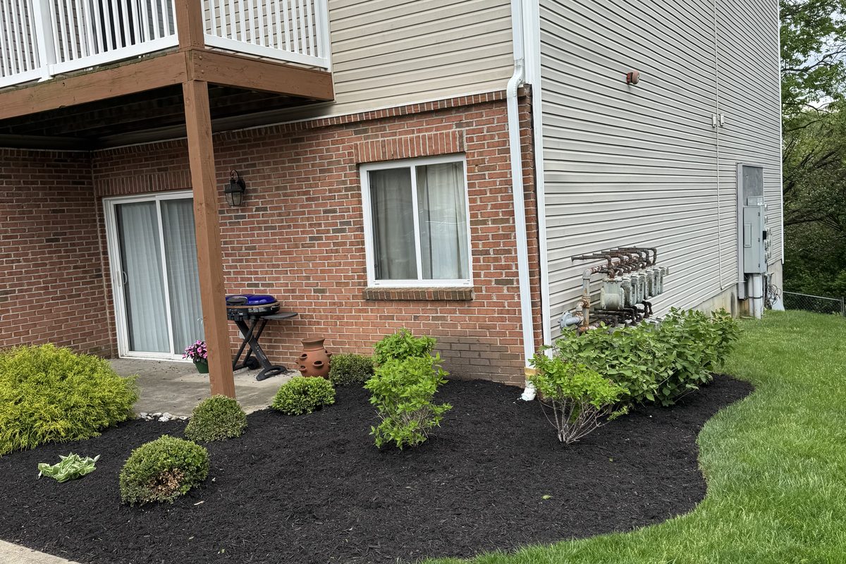 Commercial landscaping crew maintaining a Cincinnati west side property