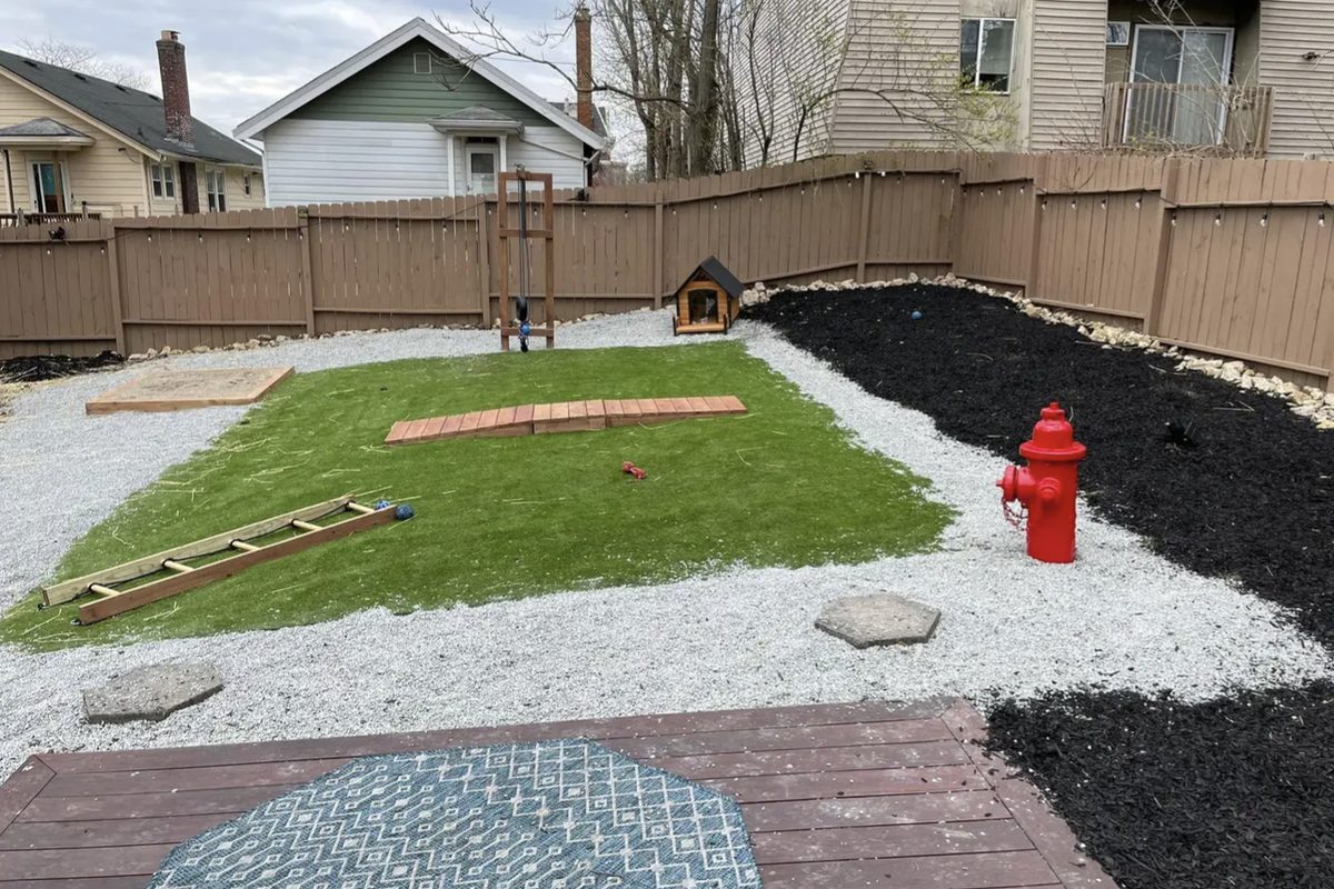 Privacy fence installed along a sloped property line on Cincinnati's west side