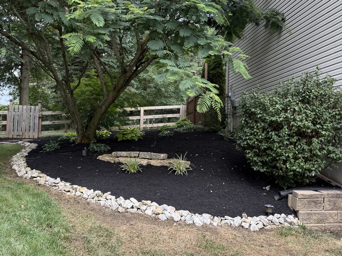 Rebuilt planting beds with rock and new plantings, west side Cincinnati
